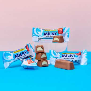 SNAQ FABRIQ Milky Candy Šokolaadikommid kreemitäidisega, 130 g – madala kalorsusega toode firmalt Snaq Fabriq, osta SportFit-ist